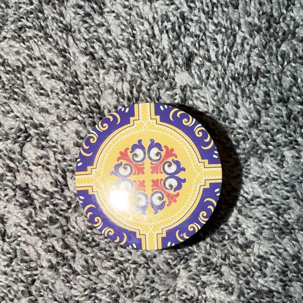 Colorful Round candle with Intricate Design